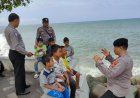 Patroli Pantai Boom Ampenan, Polisi Imbau Wisatawan Waspada Cuaca Ekstrem dan Gelombang Laut